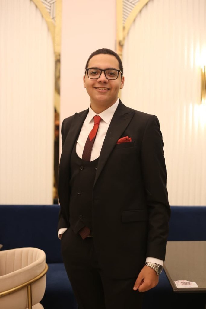 Bassem Ashraf standing in a café